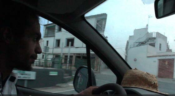 Gonzalo driving, seen from the passenger seat.