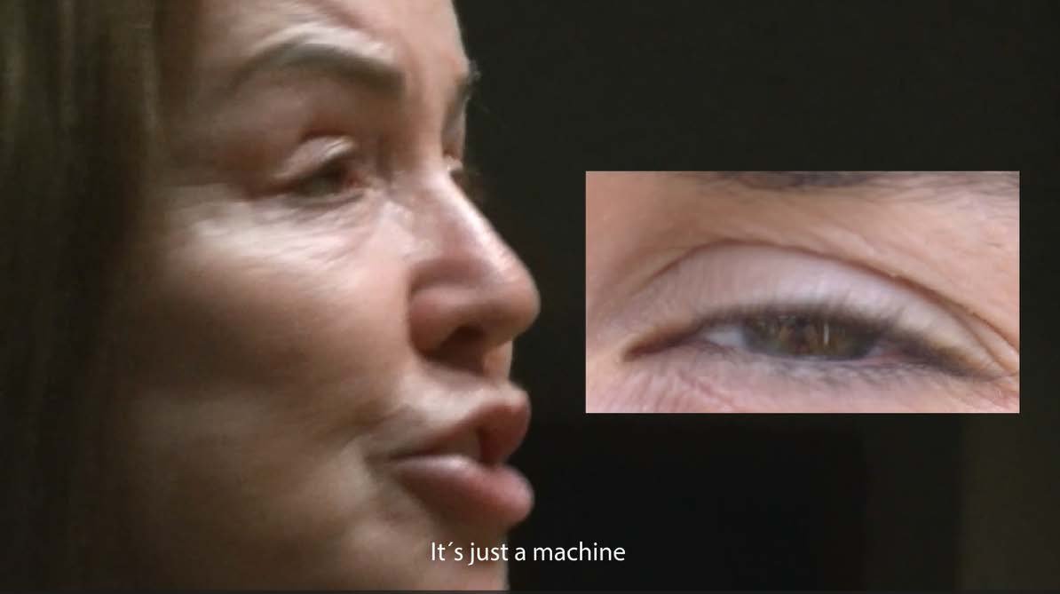 Martina in close-up, mid-sentence: “It’s just a machine”.